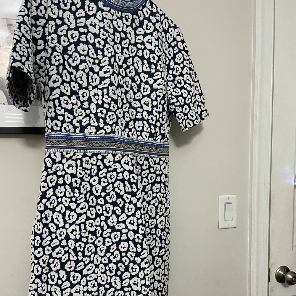 Never worn mid length, tailored navy leopard print dress